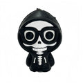 Black and white silicone skeleton focal bead with cartoon skull face and glasses