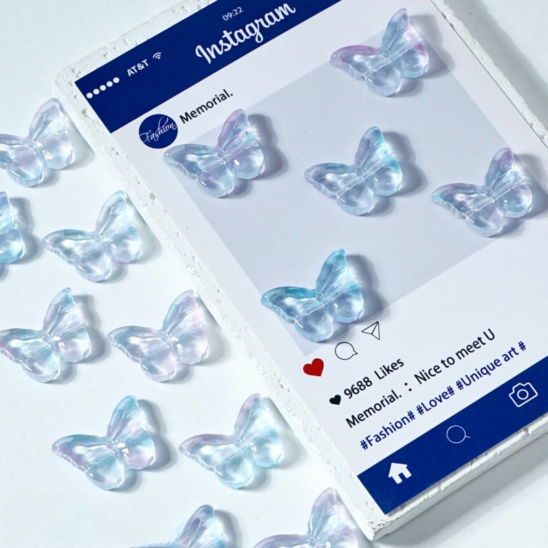 Iridescent butterfly-shaped glass beads on a white surface next to an Instagram post mockup