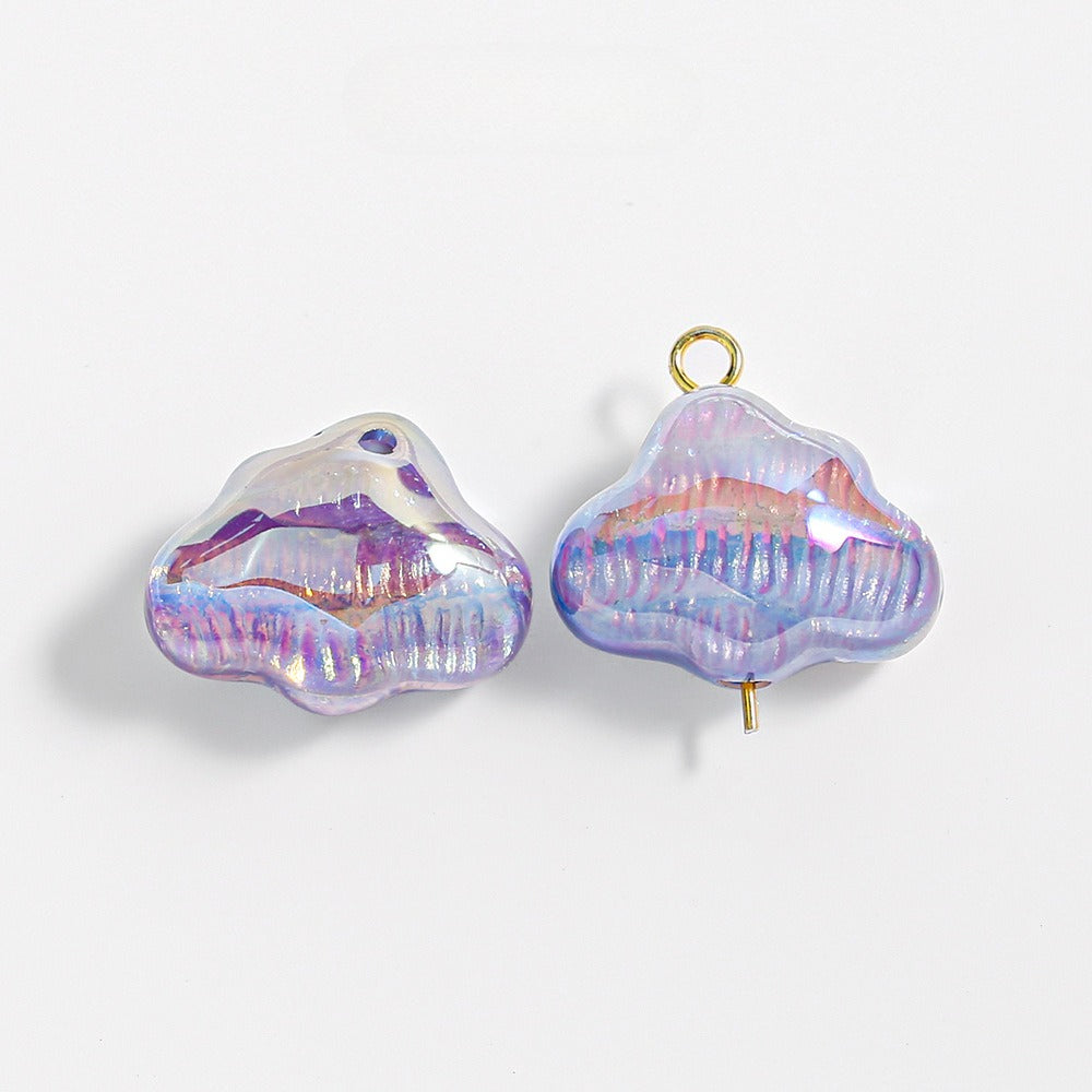 Two iridescent cloud-shaped resin beads with gold loops and pins on a white background.