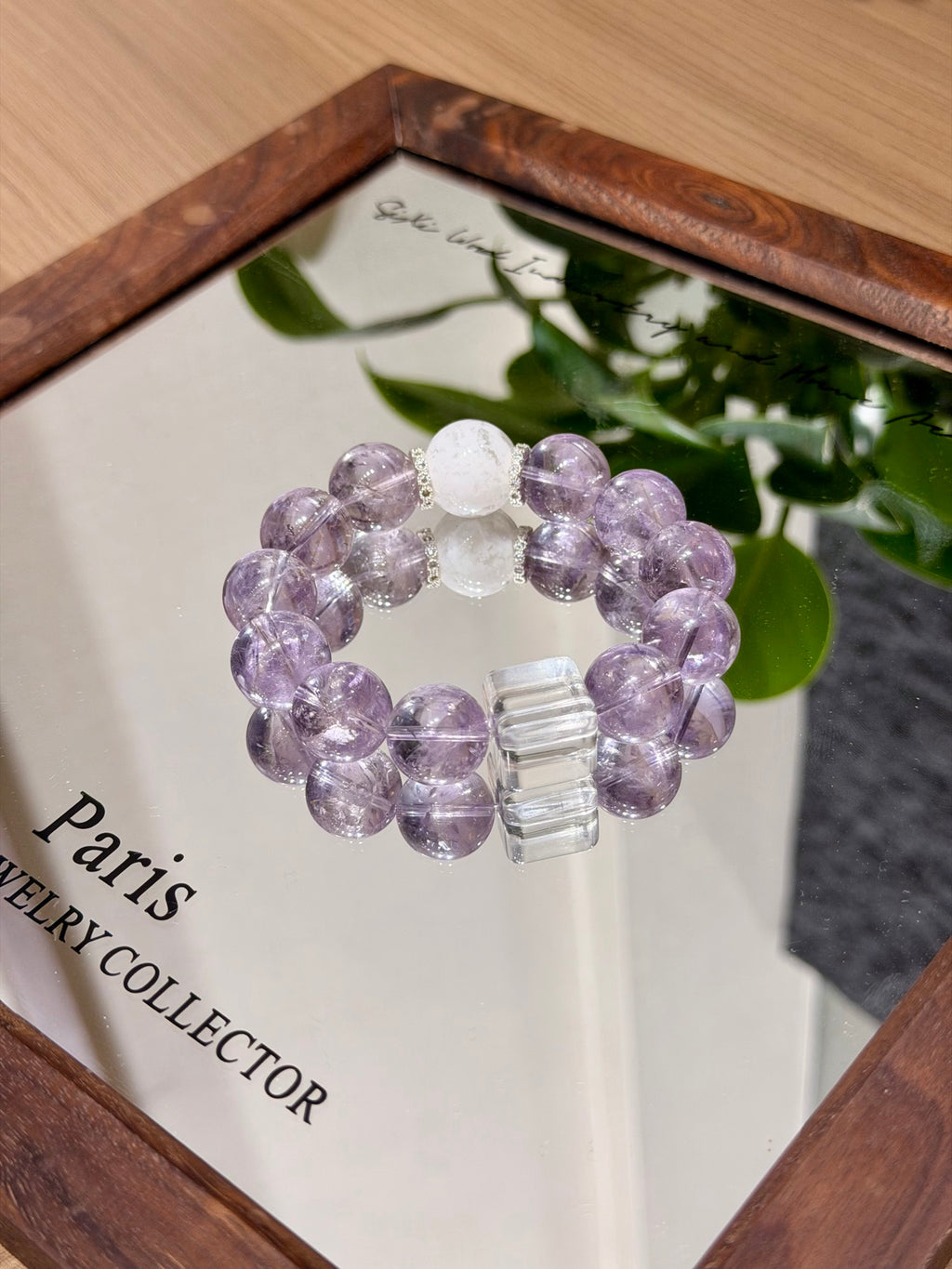 Purple mist snow bracelet with white crystal sugar cube on mirror tray