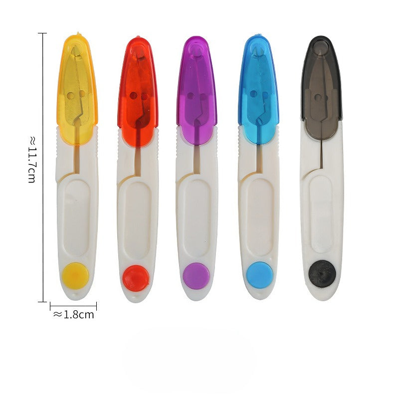 Five spring-loaded thread snips in yellow, red, purple, blue, and black arranged on white