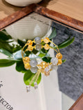 Moonfall Golden Tower bracelet with gray moonstone and yellow tower crystal beads worn on wrist