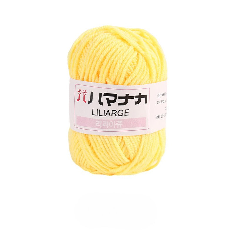 Yellow 4-ply milk cotton-acrylic yarn skein with white LILIARGE label on white background