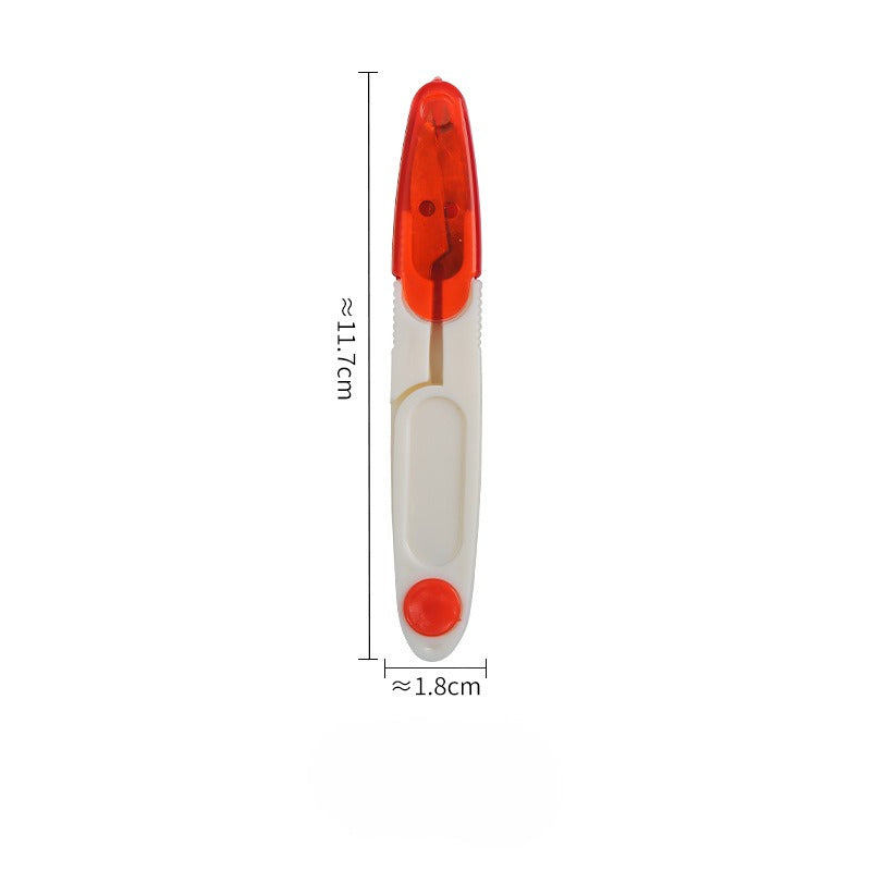 Red and white spring-loaded thread snip shown vertically with dimension lines