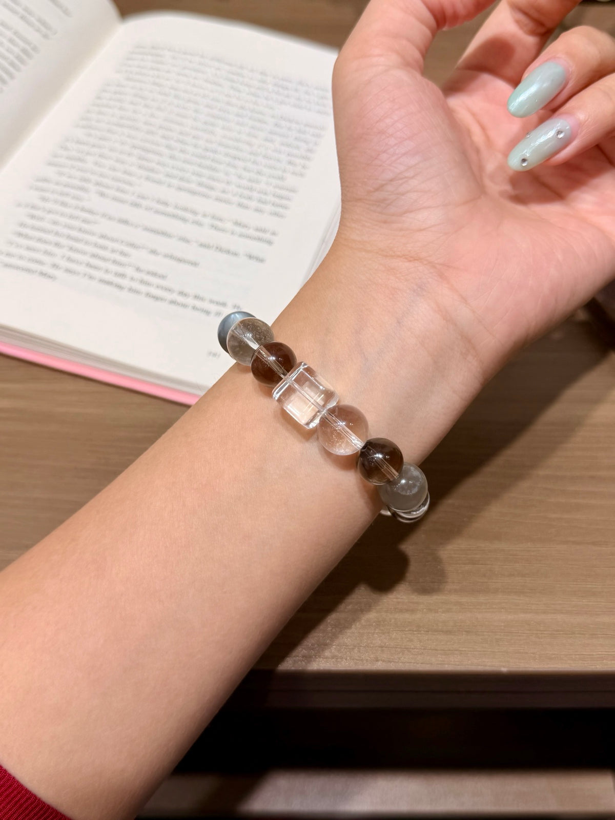 Misty coffee bracelet with milk tea moonstone worn on wrist