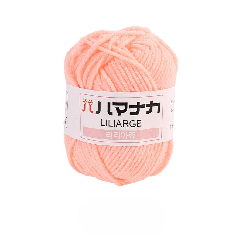 Chrysanthemum 4-ply milk cotton-acrylic yarn skein with white LILIARGE label on white background