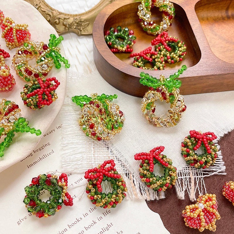 Handmade beaded Christmas wreath and apple ornaments in red, green, and gold seed beads
