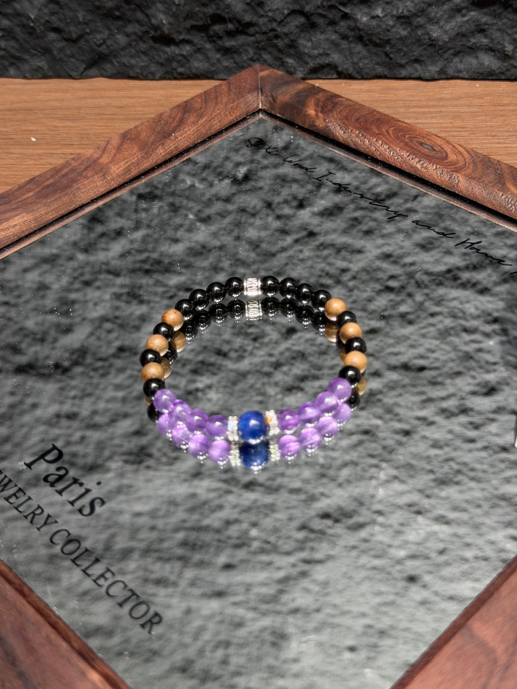 Dusk mountain bracelet with amethyst and black obsidian on mirror